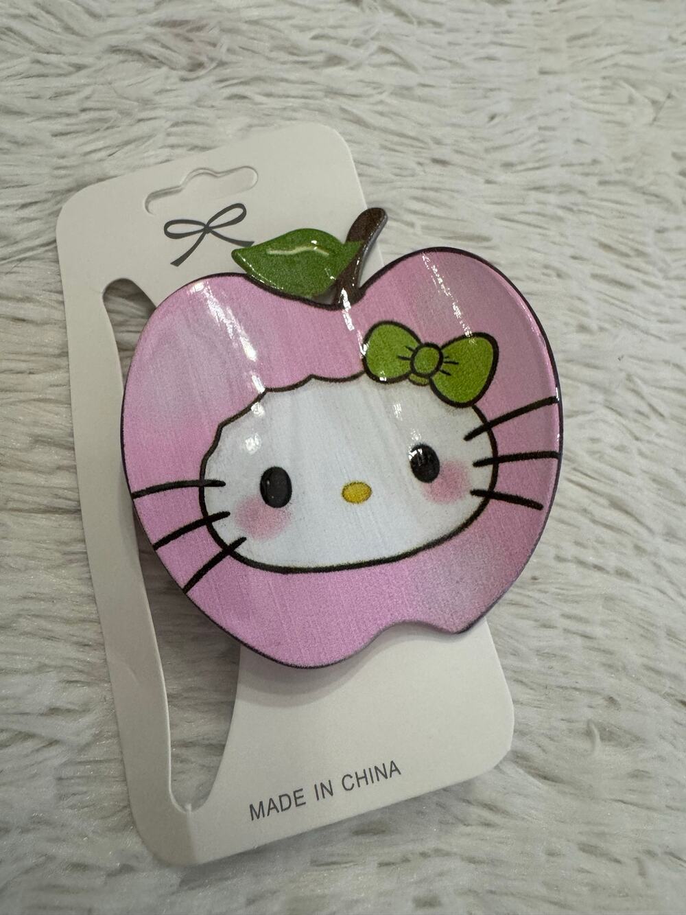 Large Pink apple-shaped hair clip claw with Hello Kitty face and green bow